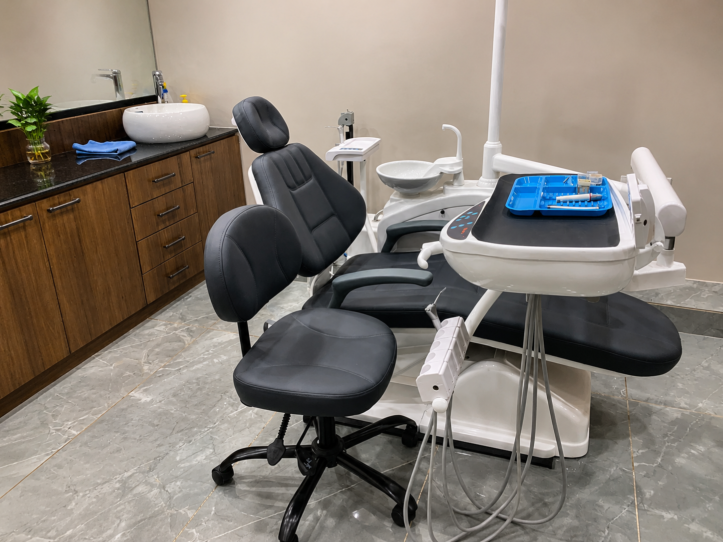 Dental operatory with chair and treatment unit